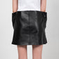 MERADA LEATHER BOW SKIRT IN BLACK