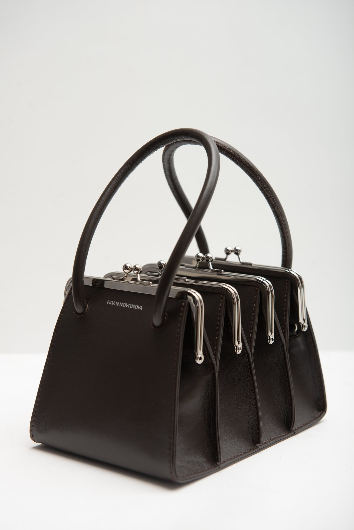 BOA FOUR CLASP BAG IN CHOCOLATE BROWN