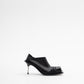 CONVERTIBLE MULE-PUMPS IN BLACK