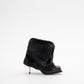 IMAN STILETTO HEEL BOOTS IN BLACK WITH BLACK FAUX FUR