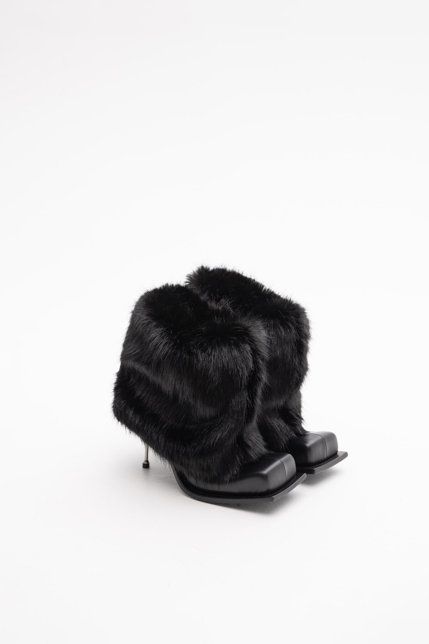 IMAN STILETTO HEEL BOOTS IN BLACK WITH BLACK FAUX FUR